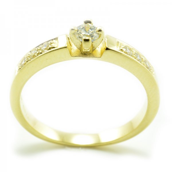 Zásnubný prsteň zo žltého zlata - 6 zirkónov po šíne prsteňa plus jeden centrálny Merry